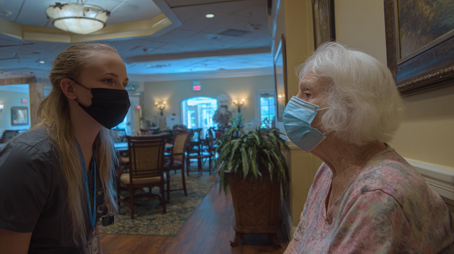 A nurse observes a resident for subtle signs of altered mental status, a key assessment from the condition change detection CE Nursing course.